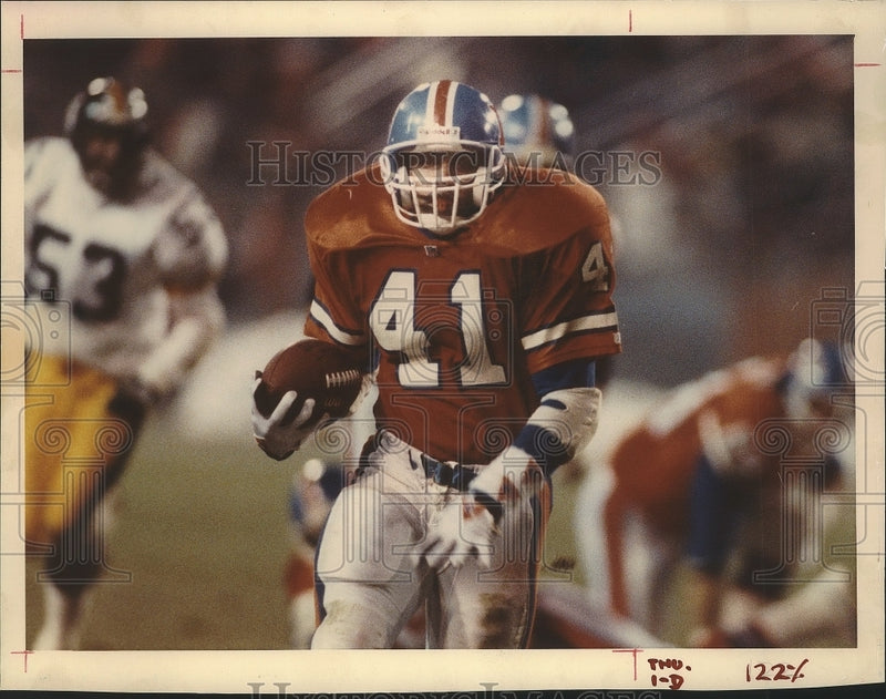 Load image into Gallery viewer, 1991 Press Photo Greg Lewis Vs Steelers - nef63610
