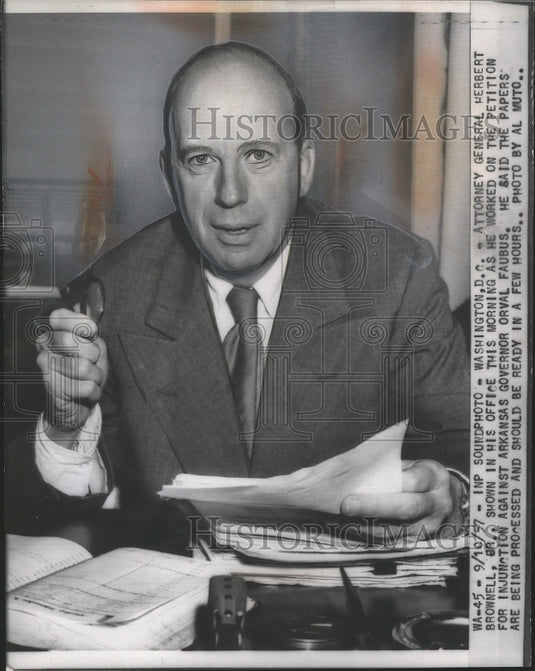 1957 Press Photo Atty. Gen.Herbert Brownell Jr shown in his office at Washington