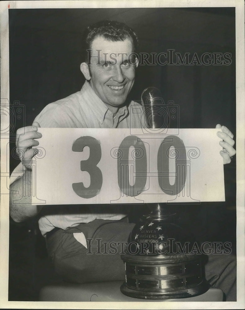 Load image into Gallery viewer, 1970 Press Photo Ed Deines with Masters Bowling Tournament Trophy &amp; "300" Sign
