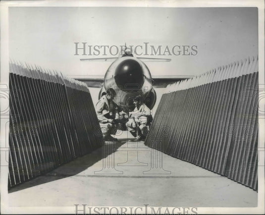 1953 Press Photo interceptor rockets lined up next to Scorpion F-890 jet