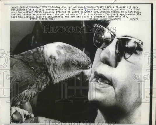 1957 Press Photo Pretty Girl 75-Year-Old Parrot Carries on Conversation