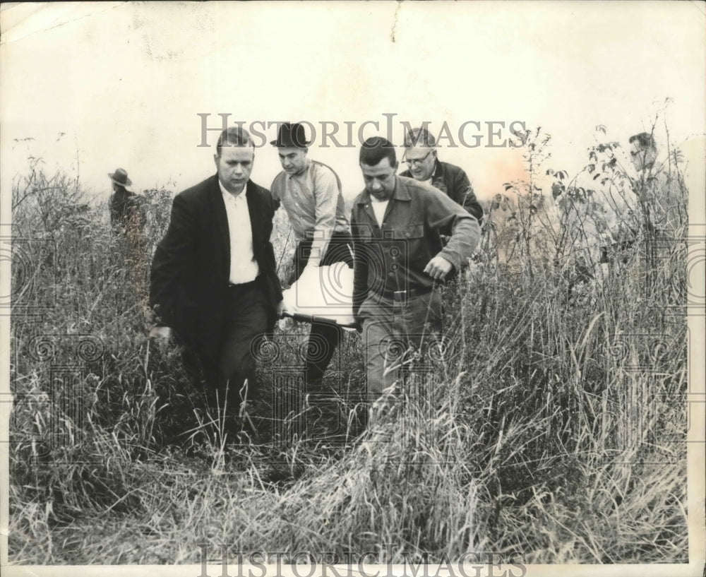 1963 Press Photo Unknown Group of Men Carrying Stretcher - nef65523
