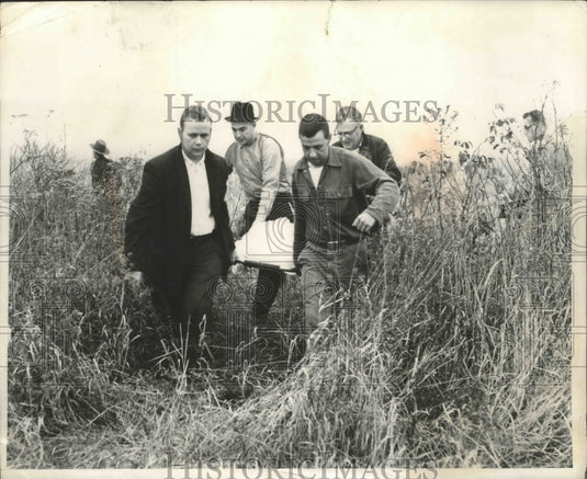 1963 Press Photo Unknown Group of Men Carrying Stretcher - nef65523
