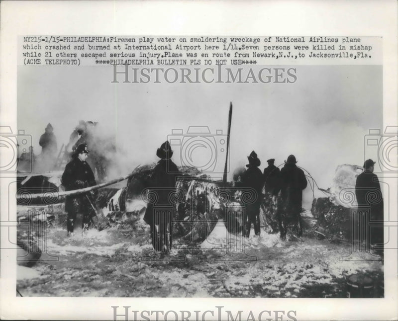 Load image into Gallery viewer, 1951 Press Photo Firemen Place Water on Wreckage of National Airlines Plane
