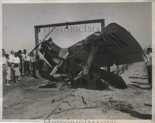 1935 Press Photo Dr. F.E. Townsend in Plane that Crashed Into Fence at Departure- Historic Images