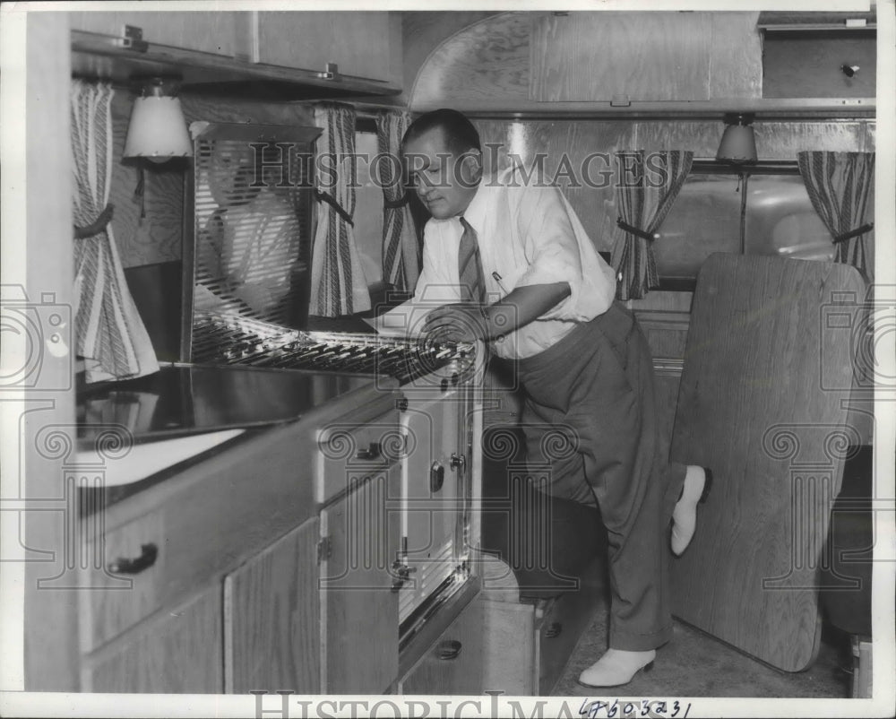 1941 Press Photo E W Mercer Checking Interior of Trailer to be Used for Housing- Historic Images