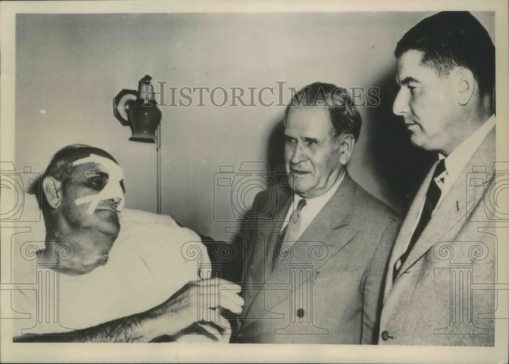 1951 Press Photo Francis Yentzer Discusses Train Accident from His Hospital Bed