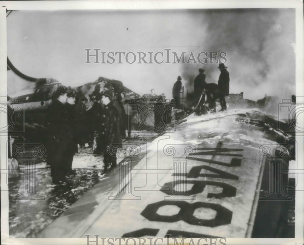 1951 Press Photo Firemen pour water Natl. Airlines DC-4 crashed in Snowstorn