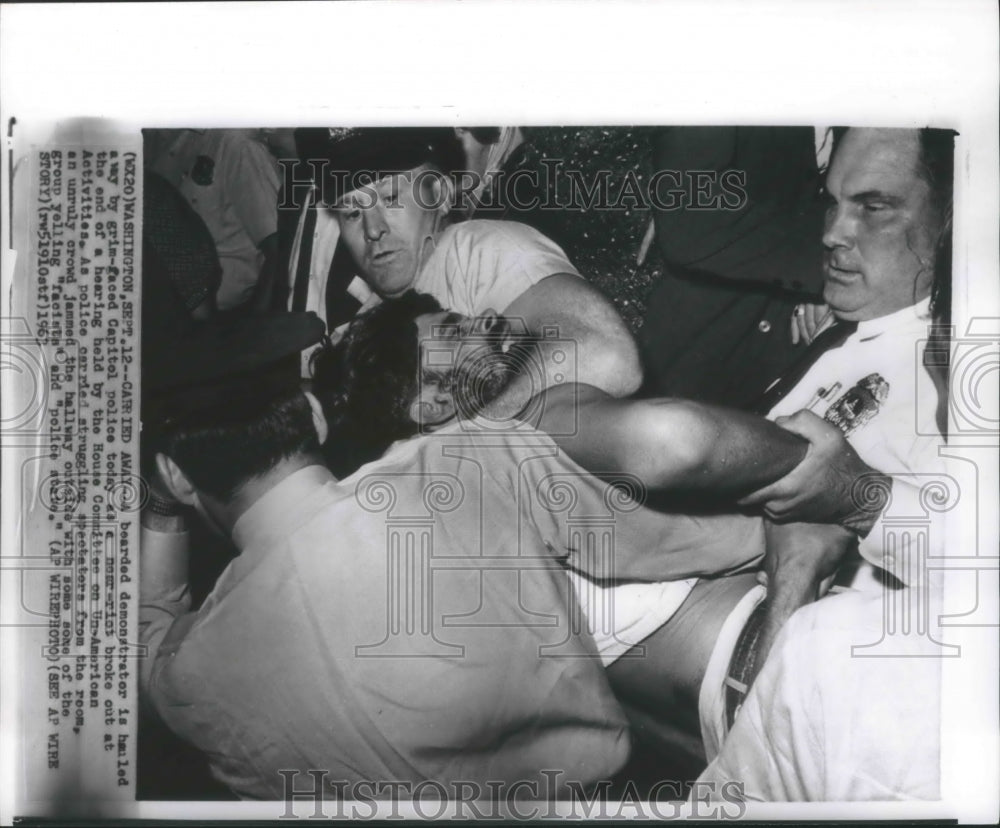 1963 Press Photo Boarded Demonstrator Hauled Away by Grim-Faced Capitol Police- Historic Images