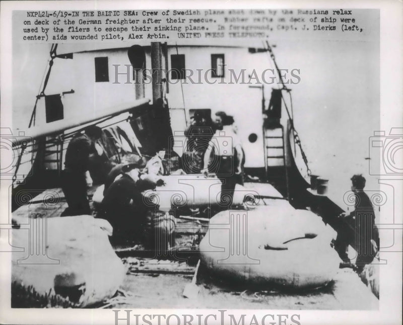 Load image into Gallery viewer, 1952 Press Photo Crew of Swedish Plane crashed rescued on German Feighter

