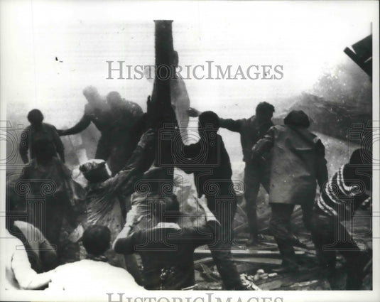 1963 Press Photo Rescuers life piece of wreckage of U.S Navy Skyhawk Jet Fighter
