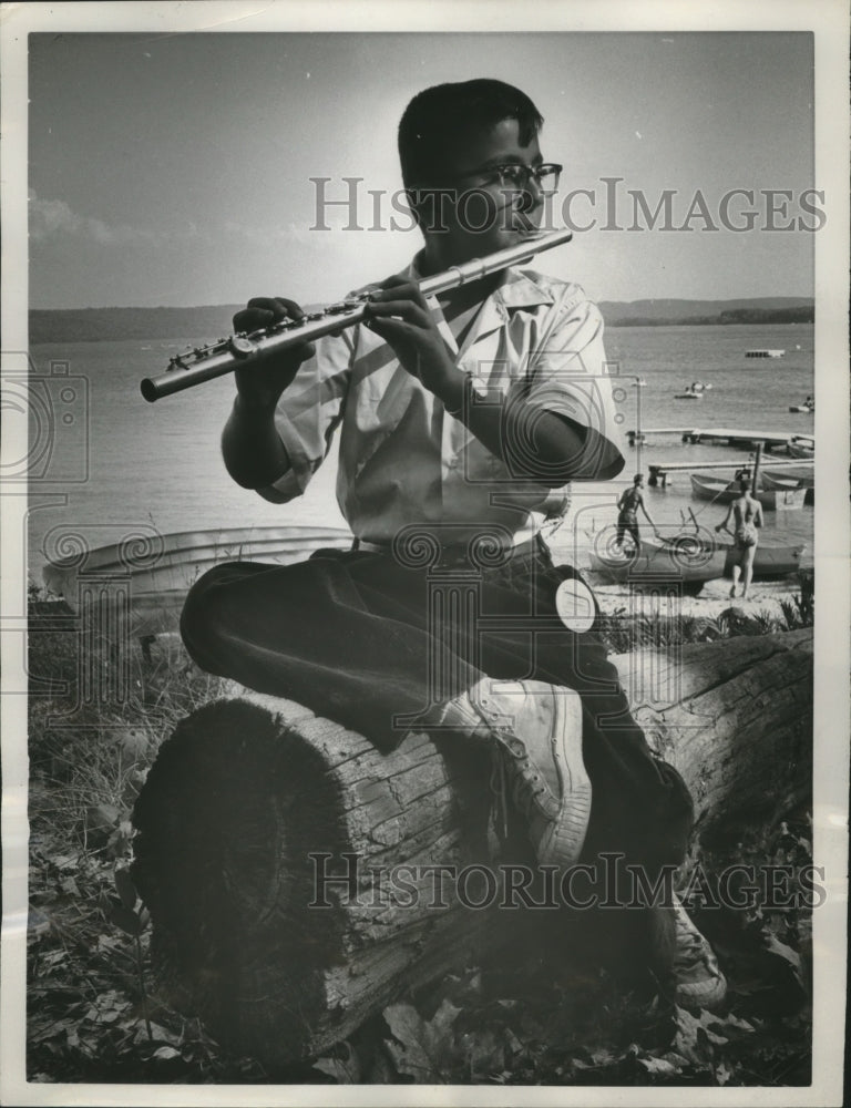 Load image into Gallery viewer, 1961 Press Photo John Saurini Practices His Flute At The Music Camp - nef69396
