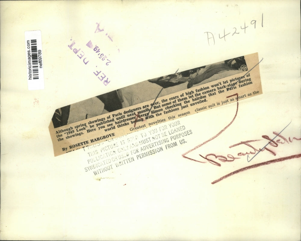 1949 Press Photo Hairdresser Serge Simon Checks the Latest Paris Hairdos