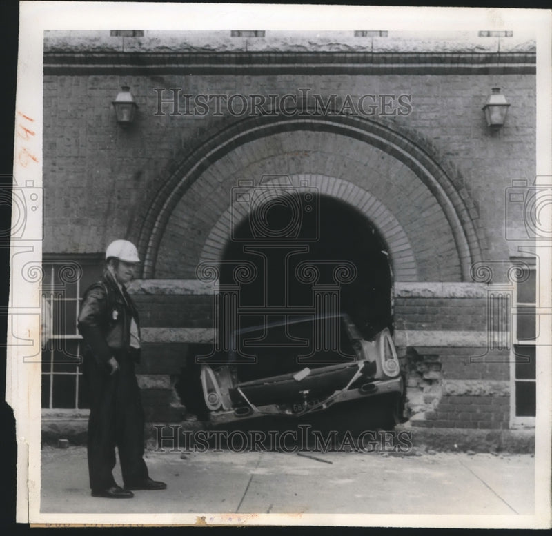 Load image into Gallery viewer, 1960 Press Photo Motorcycle Patrolman H. H. Moyton Inspects the Damage at Church

