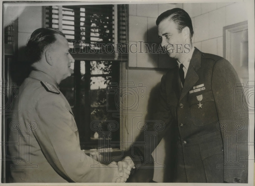 1945 Press Photo John Roosevelt congratulated by Rear Admiral Van Ragsdale