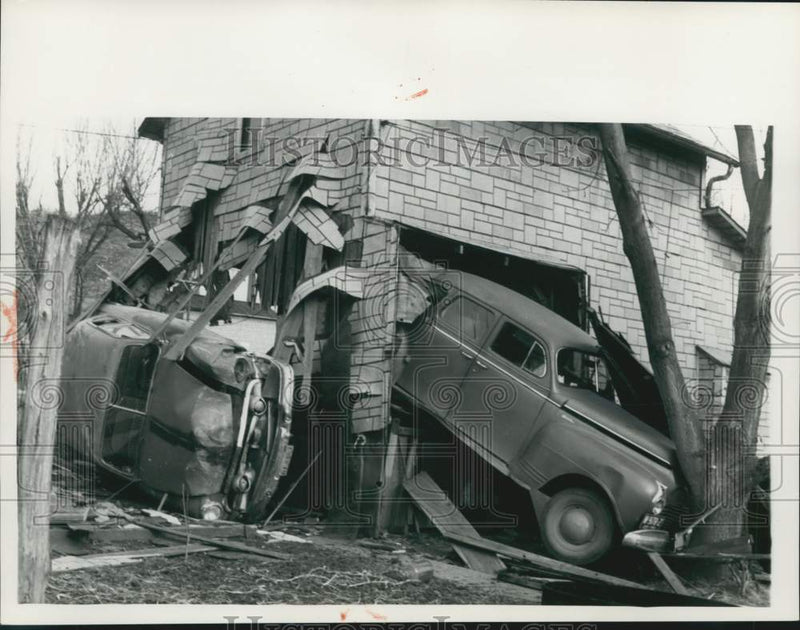 Load image into Gallery viewer, 1959 Press Photo Two Autos Crash Through Building One Stopped by Tree
