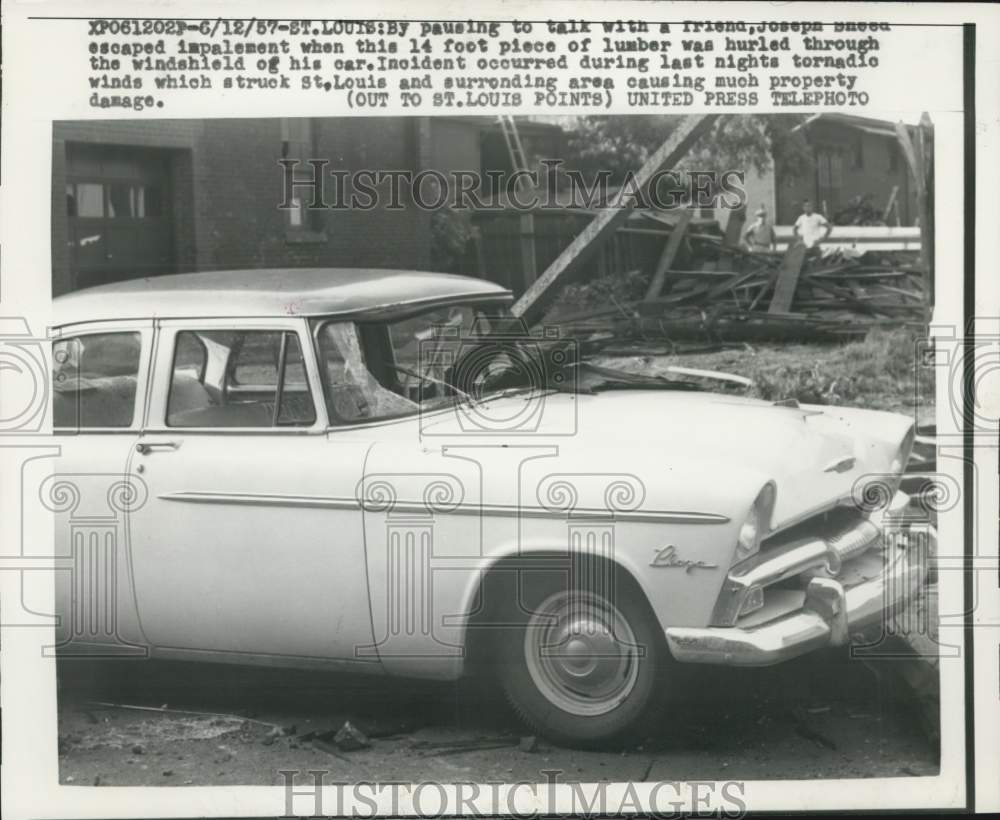 1957 Press Photo Plank of wood hurled through car windshield during a storm- Historic Images