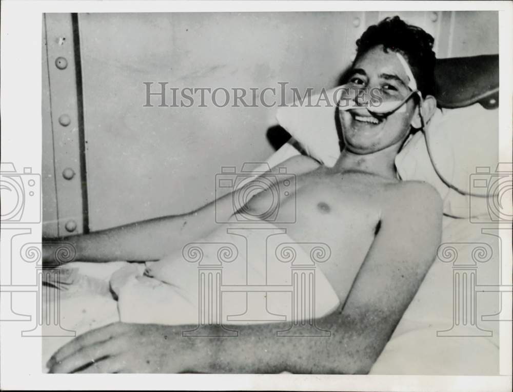 1945 Press Photo American seaman Russell Denman is treated for illness at sea