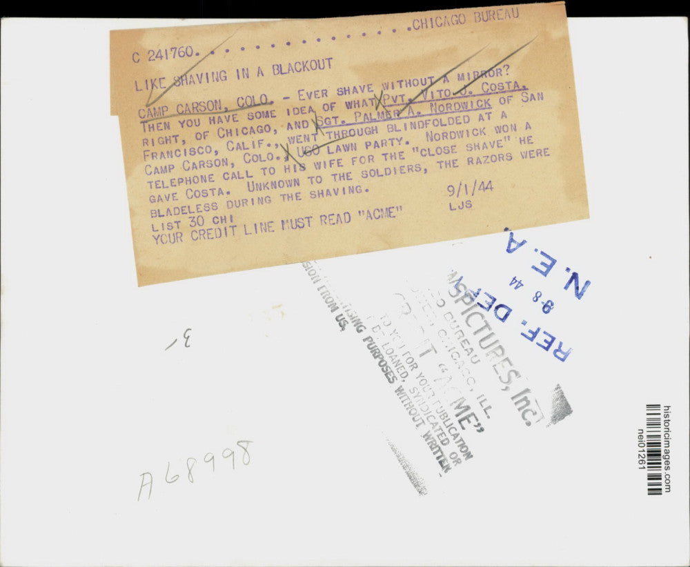 1944 Press Photo Pvt. Vito J. Costa, gets "blindfolded" shave at USO party, CO