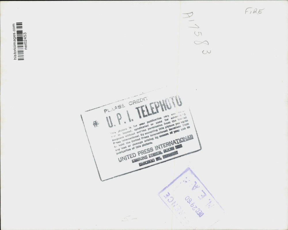 1960 Press Photo Aircraft carrier Constellation lists as firemen battle fire, NY