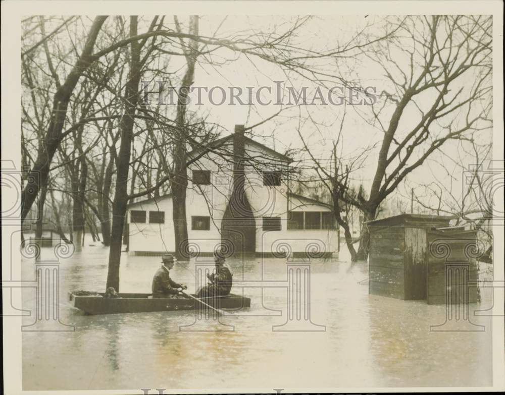 1937 Press Photo Residents of Miami Grove travel by boat in flood waters, Ohio- Historic Images