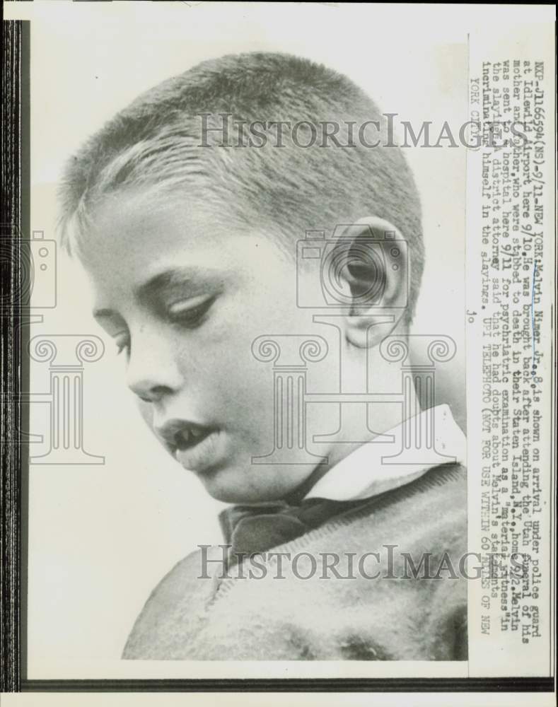 1958 Press Photo Melvin Nimer, Jr., under police guard at Idlewild Airport NY- Historic Images