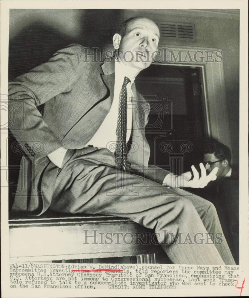 1951 Press Photo Adrian W. DeWind answering reporters in Washington - nei17062- Historic Images