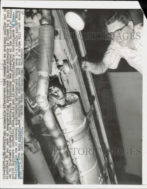 1959 Press Photo Dr. Stuart Ridgway invents automobile afterburner ...