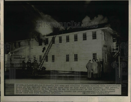 1949 Press Photo Firemen fight blaze at Oakland Army base in Clif. - nem02278
