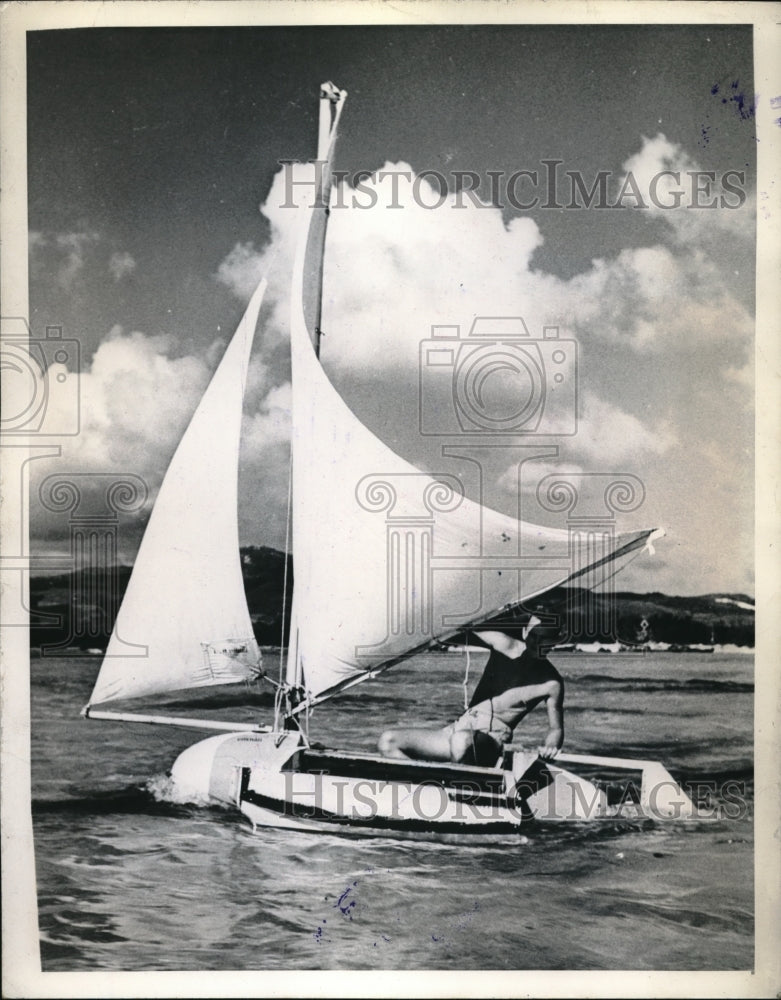 1945 Press Photo a US Air Force man rides on his home-made yacht in the Marianas- Historic Images