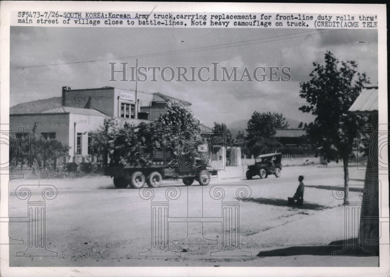 Load image into Gallery viewer, 1951 Press Photo Korean Army trucks carrying replacement for front line duty
