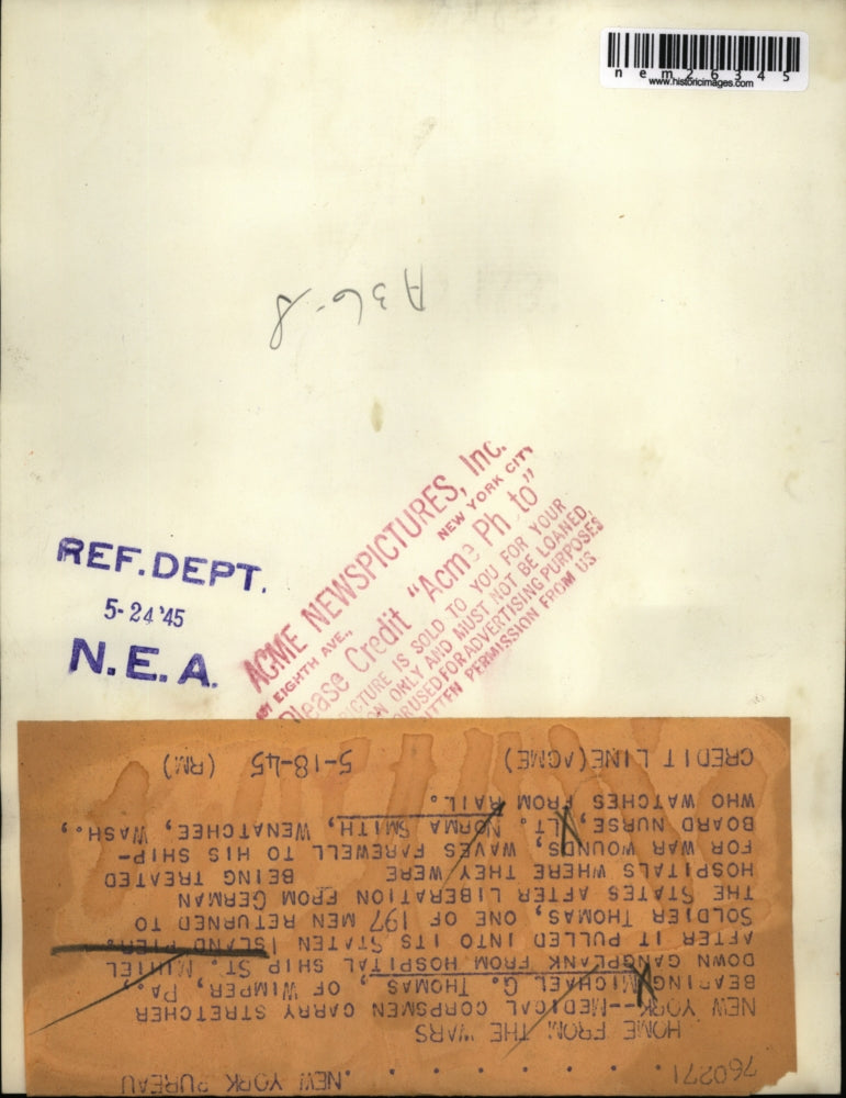 1945 Press Photo Michael G.Thomas carry by Medical Corpsmen from St. Mihiel Ship