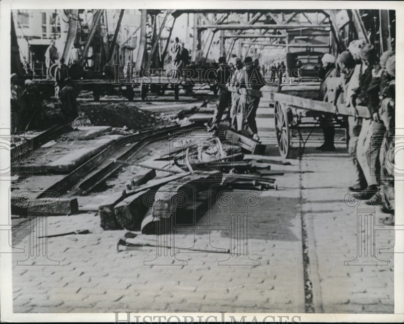 Load image into Gallery viewer, 1943 Press Photo Native Workers Repair Casablanca After U.S. Bombing Attacks
