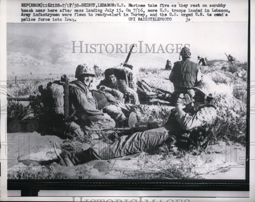 1958 Press Photo US Marines Take 5 as They Rest on Beach After Mass Landing- Historic Images