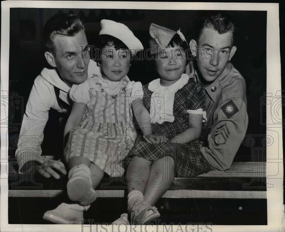 1951 Press Photo Pair of Sendai Misses Attracted by Uniforms & Headgear