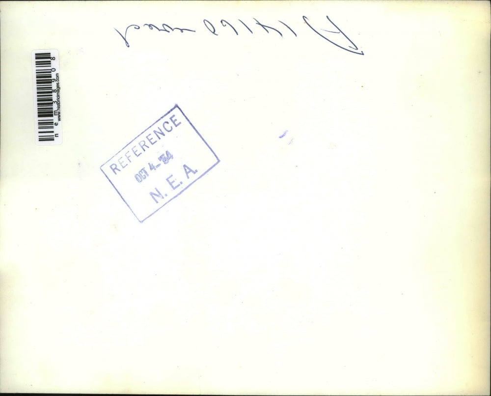 1954 Press Photo Firemen fight fire in remains of crashed T-33 jet plane