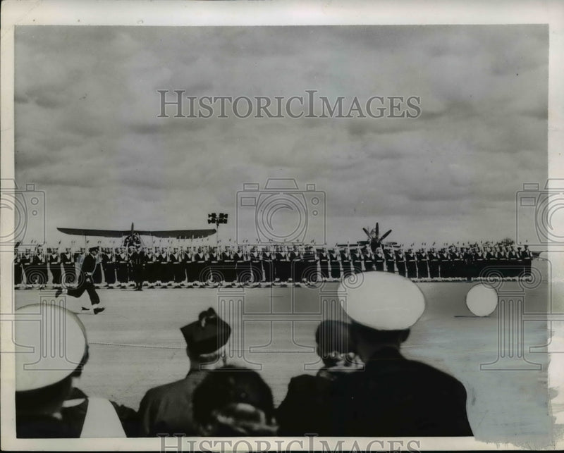 Load image into Gallery viewer, 1956 Press Photo Sailor Chases Drum at Fleet Air Arm at Lee on Solent Parade
