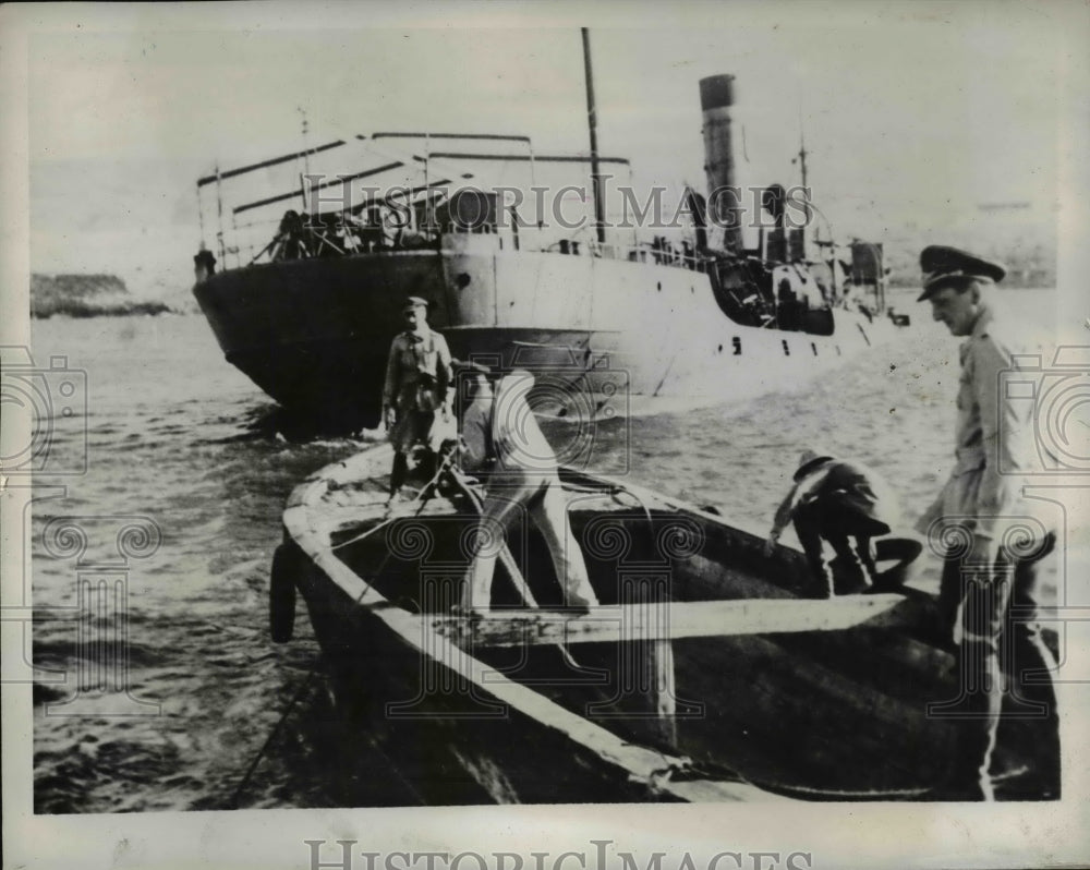 1941 Press Photo German Soldier Making Their Way Out to Half-Submerged Transport