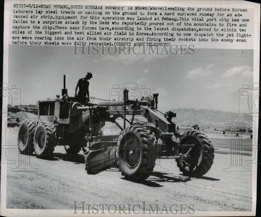 1950 Press Photo Scraper Leveling Ground Before Korean Laborers Lay Steel Treads