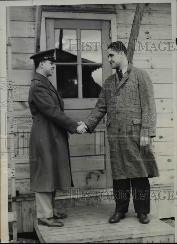 Load image into Gallery viewer, 1941 Press Photo Captain George Zegolis Greets White Sox Pitcher at Battle Creek

