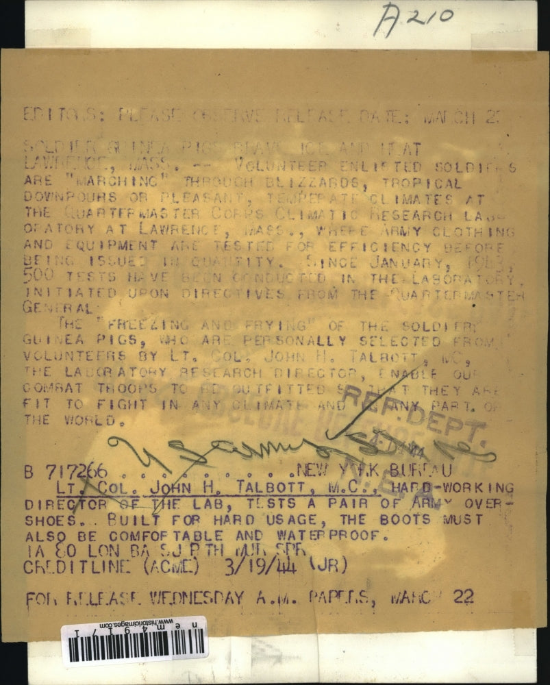 1944 Press Photo Lt Col John H Talbott Tests Army Overshoes Built for Hard Usage