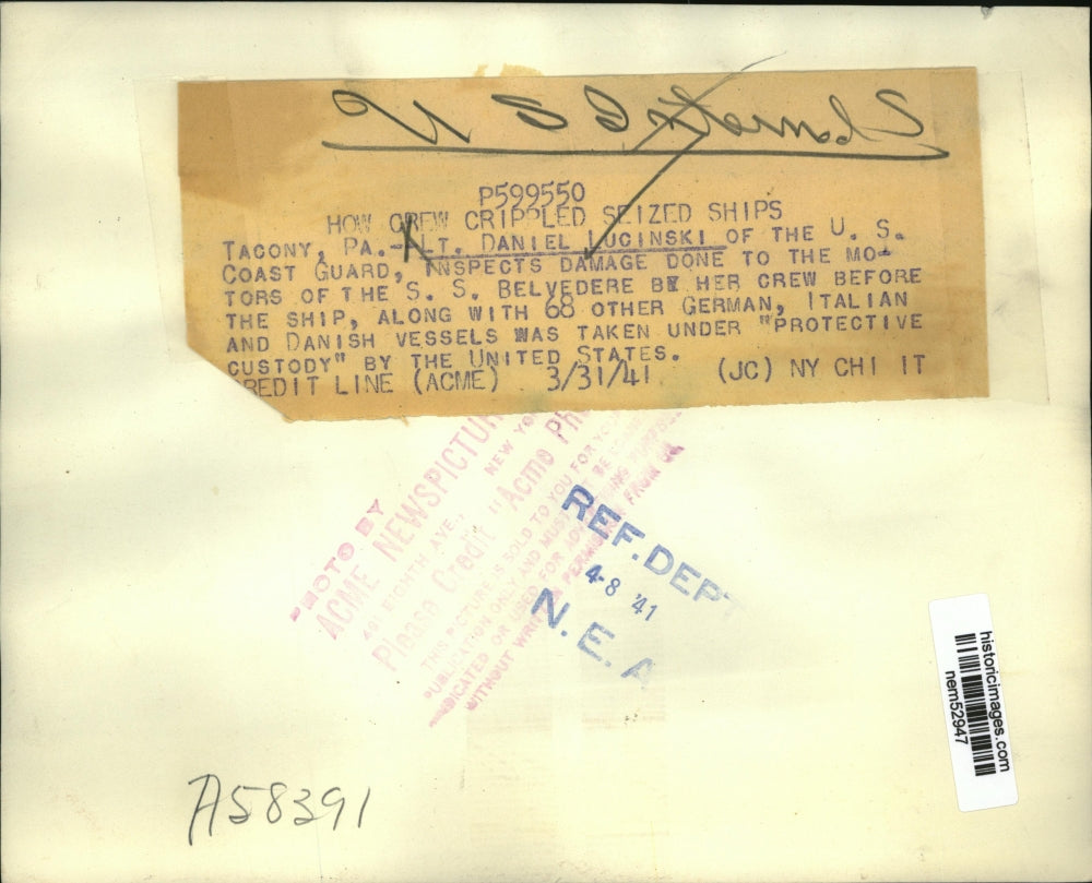 1941 Press Photo Lt. Daniel Lucinski inspects the motor of the S.S. Belvedere