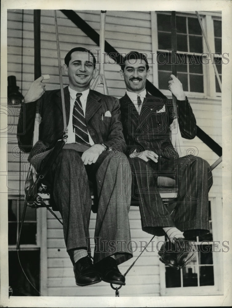 Load image into Gallery viewer, 1943 Press Photo Carlos Mersan &amp; Luciano Gomez View Parachute Jumping Tower
