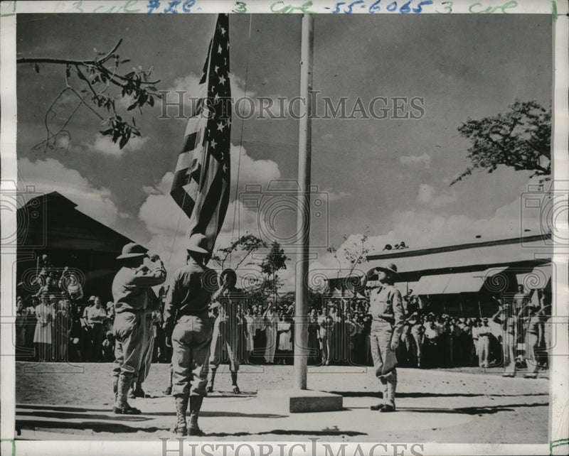 Load image into Gallery viewer, 1942 Press Photo Col Earl Cranston Ewert Hoists Stars &amp; Stripes for First Time
