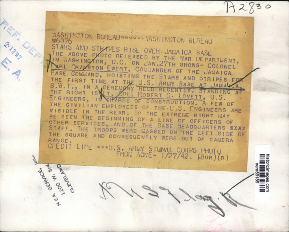 1942 Press Photo Col Earl Cranston Ewert Hoists Stars & Stripes for First Time