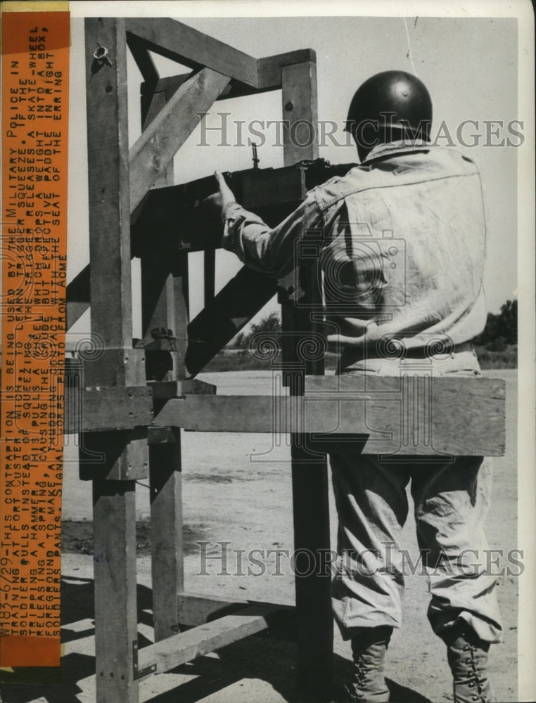 1945 Press Photo Military man uses contraption during training at Fort Custer- Historic Images