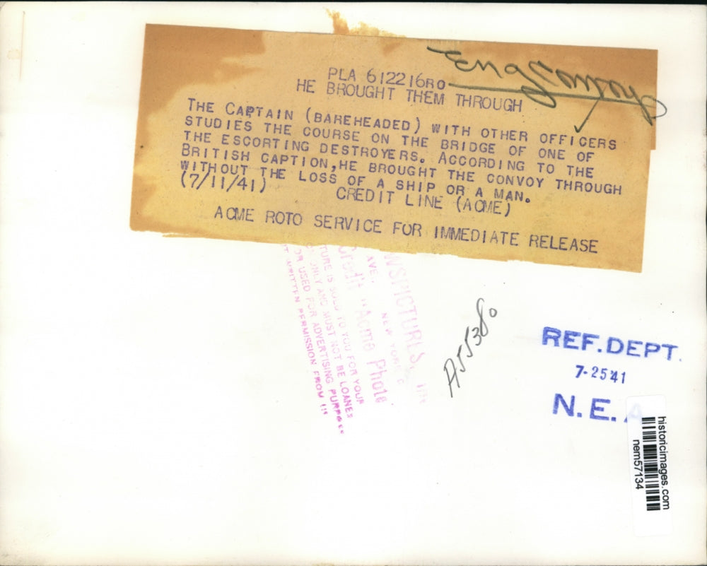 1941 Press Photo British Captain and his officers study their journey