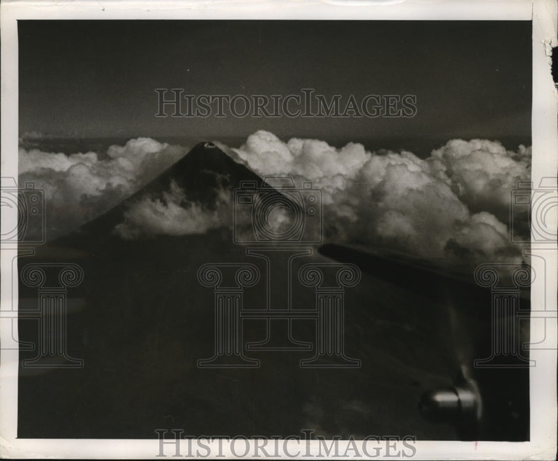 Load image into Gallery viewer, 1947 Press Photo Tip of Myan Volcano in Luzon lifts above the clouds - nem57285
