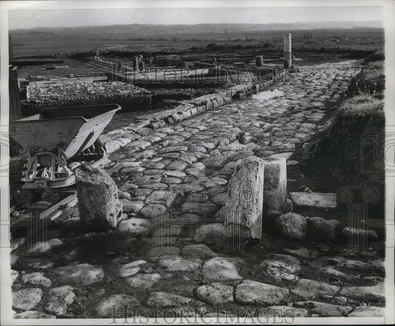Load image into Gallery viewer, 1960 Press Photo Ancient Cobbled Road Brought to Light by Excavations at Feronia
