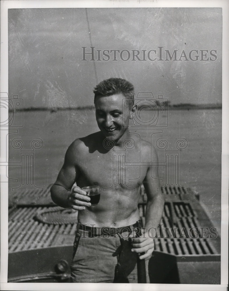 Load image into Gallery viewer, 1953 Press Photo Red River Sailor Drinking Red Wine on French Navy Ship
